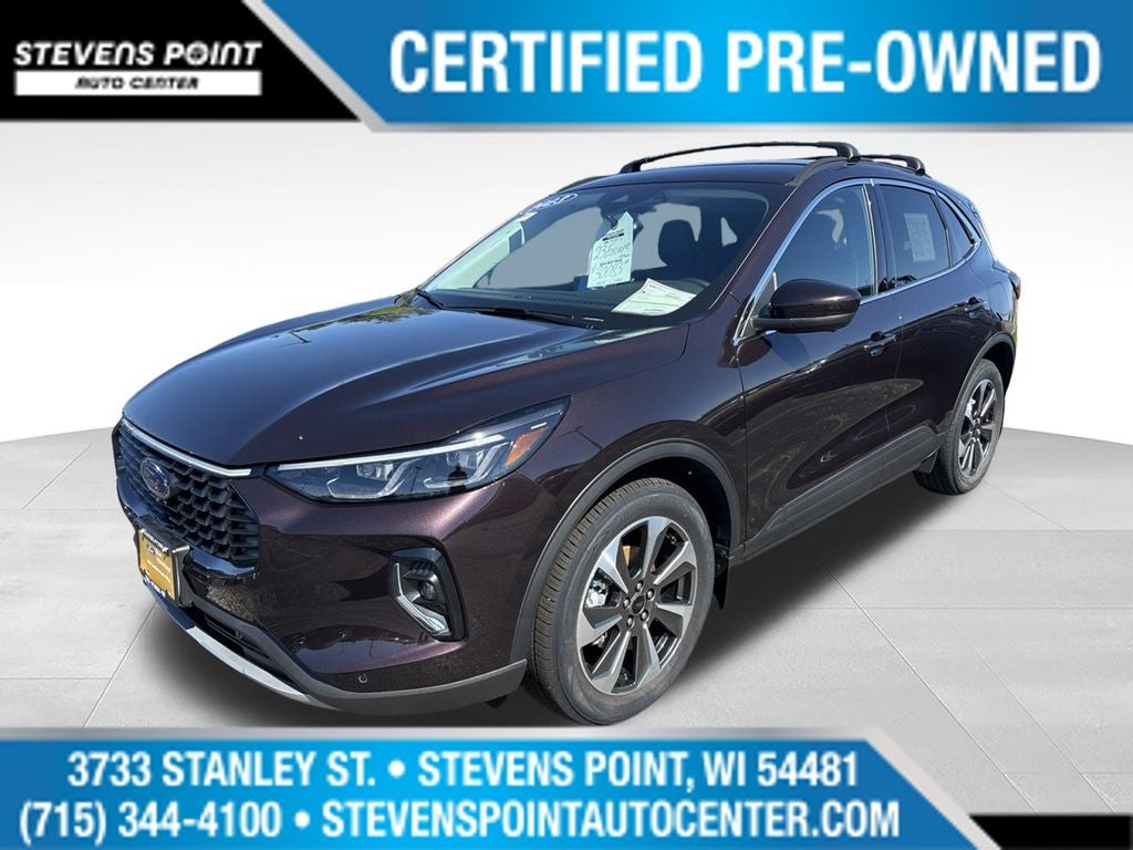 2023 Ford Escape Hybrid Platinum in Cinnabar Red Metallic Premium Colorant — front three-quarter view