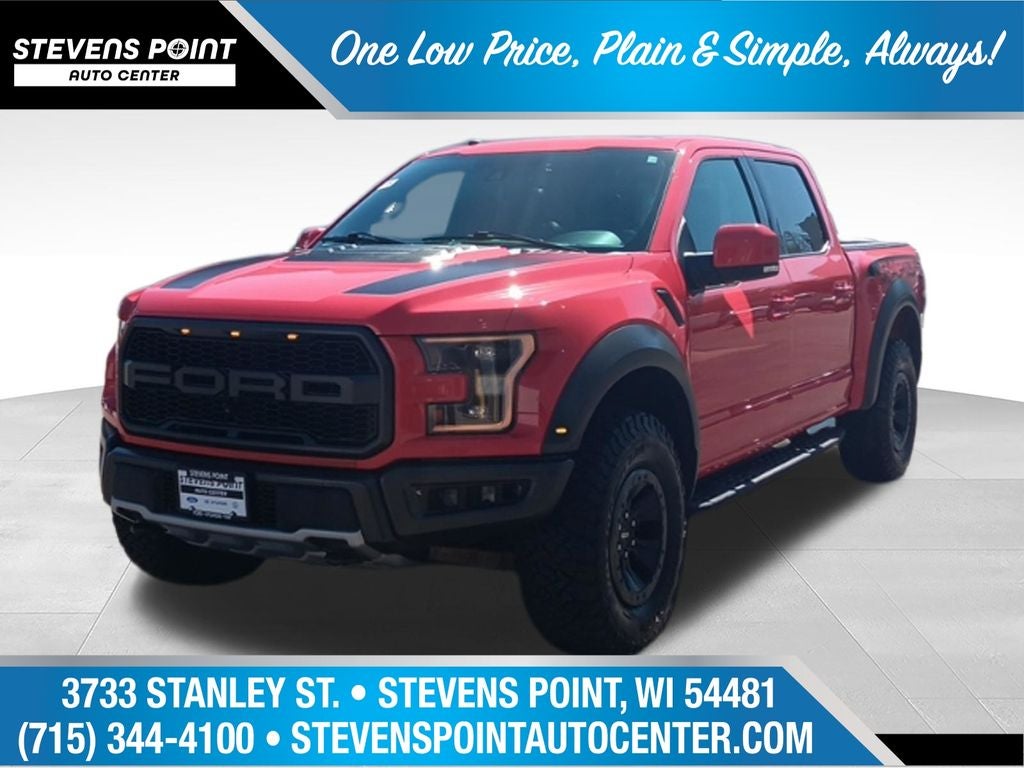 2018 Ford F-150 Raptor in Race Red — front three-quarter view